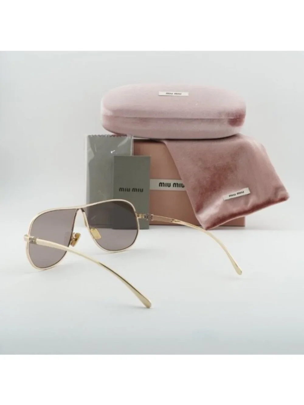 Miu Miu MUA56S 5AK20I Geometric Sunglasses – Gold/Purple Brown